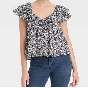Universal thread flutter top
